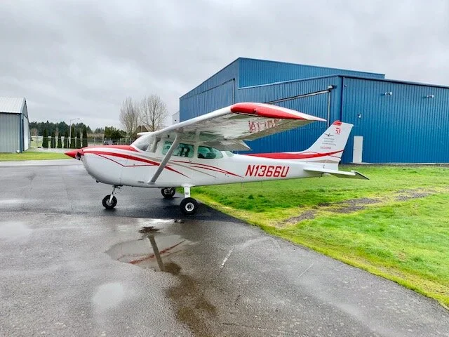 Cessna 172 side view on the ramp at McMinnville